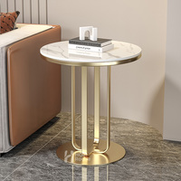 Table basse ronde personnalisée en marbre et pierre frittée avec piètement en acier inoxydable pour hôtel, villa, appartement, café