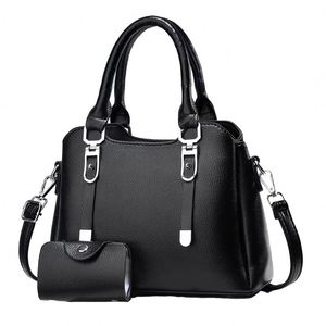 Bolso redondo de verano estilo bohemio para mujer, hecho de ratán trenzado a mano, con cierre de cordón. - Product Image 1