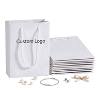 Sac en papier blanc élégant 32*11*25 personnalisé en carton recyclé pour cadeaux, marques de magasins, emballages de luxe, sacs à main, vente en gros