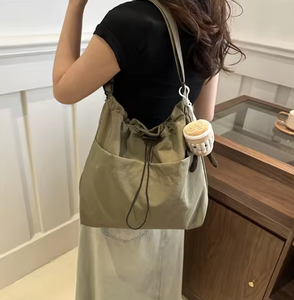 Women's fashion handbag <b>waterproof</b> nylon pleated shoulder <b>bag</b> travel casual <b>drawstring</b> canvas crossbody <b>bag</b> shopping <b>bag</b> - Product Image 1