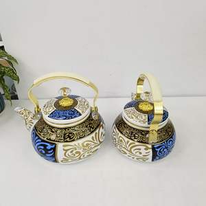 Nuovo design 2.6L grande <span class=keywords><strong>teiera</strong></span> bollitore <span class=keywords><strong>per</strong></span> acqua smaltata <span class=keywords><strong>per</strong></span> l'uso del fornello a induzione superiore del fornello a <span class=keywords><strong>Gas</strong></span> - Product Image 6