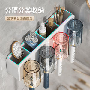 Soporte de pared para cepillos de dientes Asue con triple ventosa, organizador de baño que ahorra espacio con exprimidor de pasta dental - Product Image 1