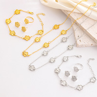 Parure de bijoux fantaisie pour femme de style européen et américain, motif trèfle à cinq feuilles porte-bonheur, comprenant collier, boucles d'oreilles et bague, plaqué or, très vendue