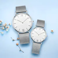 Minimalist yeni tasarım sevgili saati erkekler kadınlar paslanmaz çelik kayış örgü OEM kristal Unisex Modern yuvarlak 3ATM Quartz saat