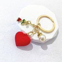 Cadeau romantique pour la Saint-Valentin, élégant porte-clés pendentif macaron pour femme, en alliage métallique durable, rose lumineuse, accessoire de sac