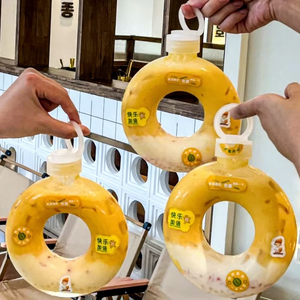 Jus rond en forme de beignet 300ml en PET personnalisé spécial thé au lait Boba tasse en plastique milk-shake smoothie bouteille peut avec couvercle à anneau de traction - Product Image 1