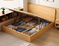 Lit plateforme pneumatique moderne japonais minimaliste en pin massif avec rangement intégré et tête de lit fine sur pieds