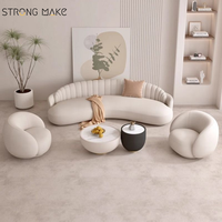 Canapé sectionnel incurvé blanc, style scandinave moderne et luxueux, idéal pour salon, hall d'hôtel ou petit appartement.