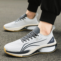Chaussures de sport de haute qualité à talon bas en maille tissée pour la course et le jogging avec semelle intérieure durable en caoutchouc et TPU
