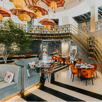 Canapé d'angle rond de luxe pour restaurant occidental avec table et chaises, en tissu, pour hôtel, design moderne et écologique