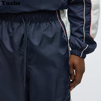 Pantalon de jogging streetwear à jambes larges en nylon avec empiècements, pantalon de survêtement pour homme, taille élastique, pantalon coupe-vent empilé pour homme