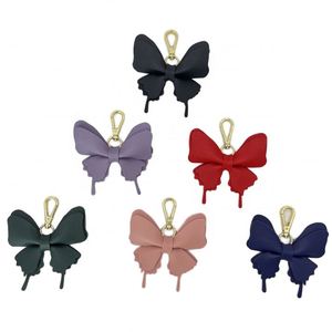 Porte-clés papillon mignon en cuir PU, 6 couleurs, pendentif pour sac à main pour femme, accessoire de mode de haute qualité et durable - Product Image 1
