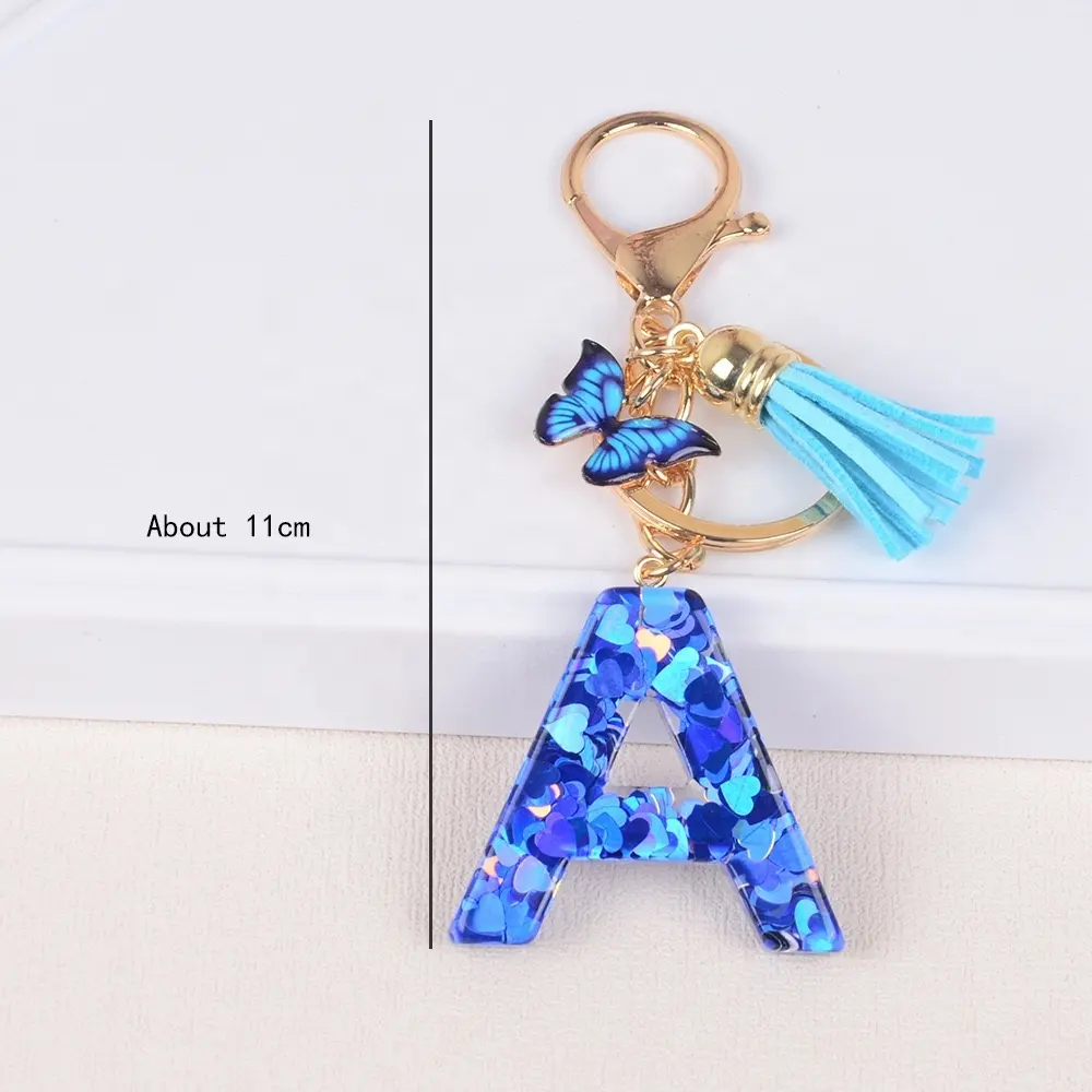 Nuovo arrivo farfalla nappa A-Z alfabeto acrilico portachiavi per le donne di alta qualità portachiavi accessori borsa Charms
