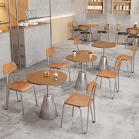 Ensemble table basse et chaises de style minimaliste italien, disponible pour la personnalisation de la taille et de la couleur de la table.