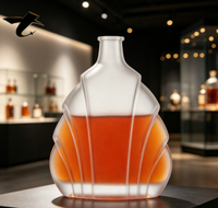 Bouteille en verre carrée élégante, prix d'usine, article très demandé, idéale pour le whisky et le brandy de distillerie