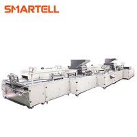 Machine de fabrication et d'assemblage d'aiguilles pour seringues hypodermiques à usage médical