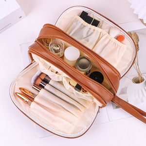 กระเป๋าเก็บเครื่องสำอางหนัง PU มัลติฟังก์ชั่นสำหรับเดินทางความจุขนาดใหญ่สามชั้นพร้อมที่จับนุ่มสำหรับจัดเก็บที่บ้าน - Product Image 1