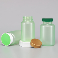 Bouteille d'emballage de compléments vitaminiques en plastique PET vert givré de haute qualité avec bouchon de sécurité pour enfants