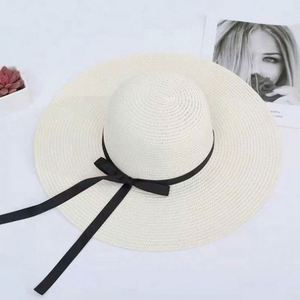 Chapeau de soleil d'été décontracté en paille de papier à large bord souple pour femme – Vente en gros à prix abordable - Product Image 3