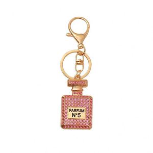 Porte-clés créatif vintage en métal, pendentif de voiture en strass, flacon de parfum imprimé en émail, sac pour femme avec impression offset - Product Image 6