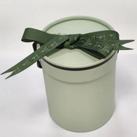 Boîte en carton cylindrique ronde de luxe personnalisée pour parfum carton ondulé avec revêtement éponge ruban décoratif emballage élégant