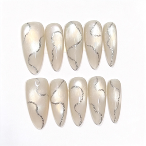 <span class=keywords><strong>Ongles</strong></span> à presser faits main, longs, forme amande, blanc crème, effet œil de chat, peints à la main, chrome argenté, gel liquide métallique, vente en gros - Product Image 1
