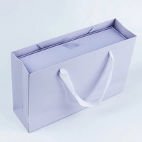 Sacs en papier kraft personnalisés pour le commerce de détail, sacs cadeaux pour vêtements, sacs d'emballage miniatures de luxe avec poignée, sacs en papier imprimés avec logos