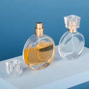 OEM özel Logo boş lüks doldurulabilir düz Botol parfüm sis sprey 50Ml 30Ml şeffaf cam yuvarlak parfüm şişesi