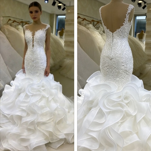 Abito da sposa a sirena con scollo illusione romantico, elegante strascico a cappella, gioiello sul petto, stile africano - Product Image 2
