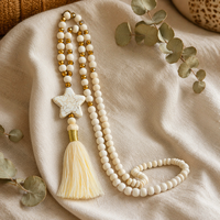 Collier bohème fait main en perles de bois avec long pendentif à pompon, bijoux de mode en gros, directement de l'usine