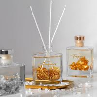 Système Vente en gros Extérieur Excellente qualité Chambre Parfumée Diffuseur de roseaux Bouteille en verre or de luxe Diffuseur de roseaux