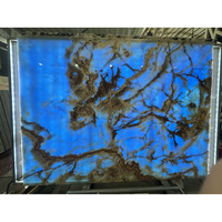 Dalle de pierre d'onyx bleu translucide naturelle rétroéclairée par LED pour mur vidéo