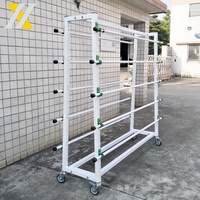 Étagères de présentation double face blanches de haute qualité, support de sol pour rouleaux de tissu, support de présentation de tapis