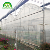 Serre commerciale avec système de culture hydroponique Serre à tunnel en poly agricole à travée multiple pour l'extérieur