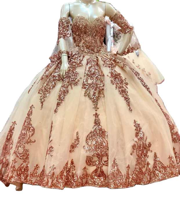 rose gold quinceanera dresses Dress 1628 Rose Gold / XSmall pleated skirt shines in patterned glitter tulle with a beautiful bow and detachable off Morilee 60181 Quinceañera Dress |