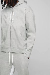 Ensemble de survêtement deux pièces personnalisé pour homme : sweat à capuche gris chiné imprimé avec empiècements contrastants et fermeture éclair intégrale, et pantalon de survêtement décontracté color block - Product Image 3