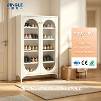 Meuble à chaussures en métal blanc avec portes en verre cannelé cintrées, rangement étanche en acier pour entrée, idéal pour projets résidentiels et approvisionnement en gros