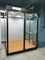 Un pod de bureau en verre trempé pour la maison, une chambre modulaire insonorisante et une cabine de fumée