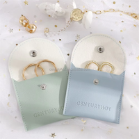 Sac pochette bleu personnalisé en PU pour bijoux avec bouton vente en gros de sacs d'emballage pour bijoux pochettes en cuir pour bijoux avec logo imprimé