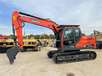Excavatrice sur chenilles hydraulique d'occasion d'origine coréenne Doosan DX140LC-9C, 14 tonnes, à vendre. Excavatrice Doosan DX140.