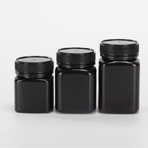 Envase Cuadrado para Medicamentos de Grado Alimenticio, Frasco de Plástico PET Transparente Marrón Oscuro Vacío para Miel de Manuka con Tapa a Prueba de Manipulación, 250g 500g 1000g - Product Image 1
