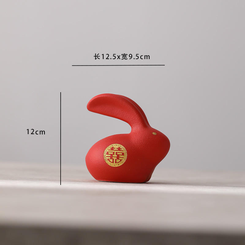 Petit lapin de jade avec une oreille