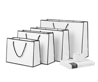 Sac en papier texturé blanc en promotion avec votre logo personnalisé pour mariage et vêtements