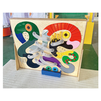 Jouet interactif de panneau de mur de course de boule en bois pour le jeu sensoriel d'intérieur d'enfants et l'utilisation de centre d'activité d'apprentissage précoce