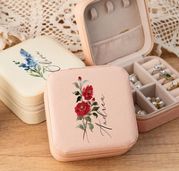Boîte à bijoux de luxe en cuir PU avec logo personnalisé, fermeture éclair, forme carrée, bordure festonnée, poignée en ficelle et nœud en ruban pour bijoux