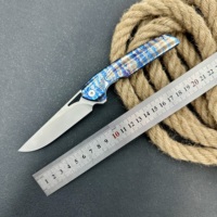 Couteau pliant de camping personnalisable en alliage de titane OEM, lame droite, bord dentelé, motif éclair, acier M42, usinage CNC de précision