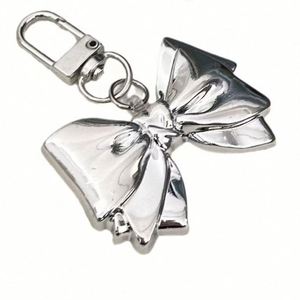 Korean Ins Creative Heart Keychain New Bow Tie <b>Acrylic</b> Decorative Pendant Rechargeable Metal Keychain - Product Image 3