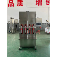Machine de remplissage de bouteilles d'eau à quatre têtes Remplisseur de seau automatique personnalisé 500 ML 20 L Structure en acier inoxydable d'équipement