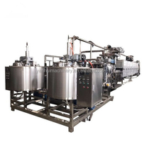 Ligne de production de bonbons entièrement automatique de grande capacité pour la confection de caramel traitement des éclairs de lait