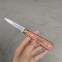 Couteau à huîtres de qualité supérieure avec acier inoxydable 100% et fourniture de matériaux en bois et en caoutchouc